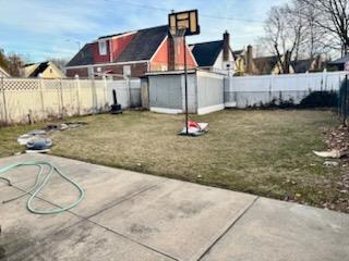 221-14 114th Rd, Cambria Heights, NY 11411 - view of yard with a fenced backyard