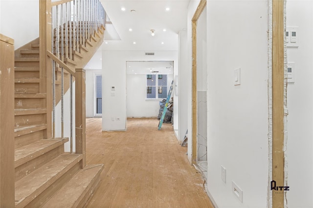 104 Stockton Unit 6, Brooklyn, NY 11206 - hallway featuring light wood-type flooring, visible vents, stairway, and recessed lighting