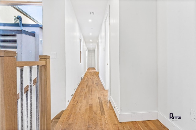104 Stockton Unit 6, Brooklyn, NY 11206 - corridor featuring light wood-style floors, recessed lighting, and baseboards