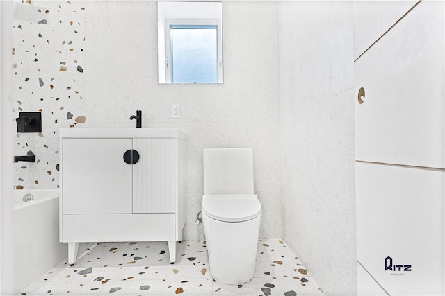 104 Stockton Unit 6, Brooklyn, NY 11206 - full bathroom featuring toilet, vanity, and tile patterned floors