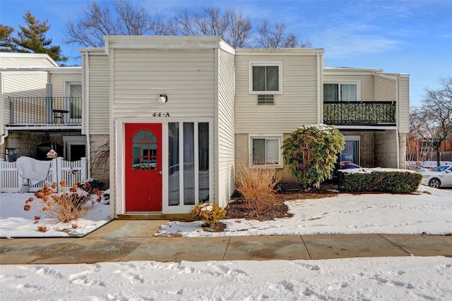 view of front of property with a balcony