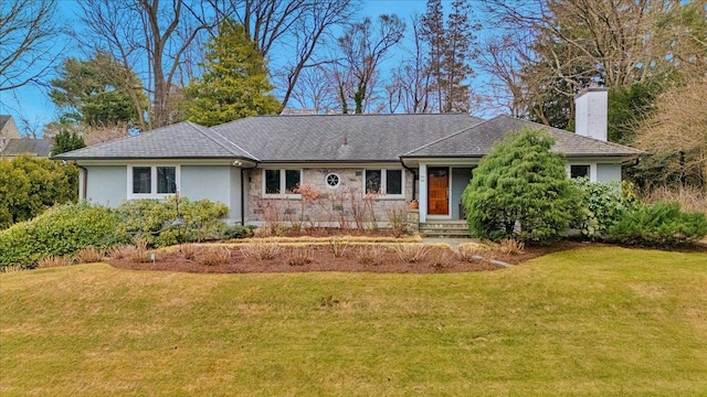 single story home with stucco siding, a chimney, a front lawn, and entry steps