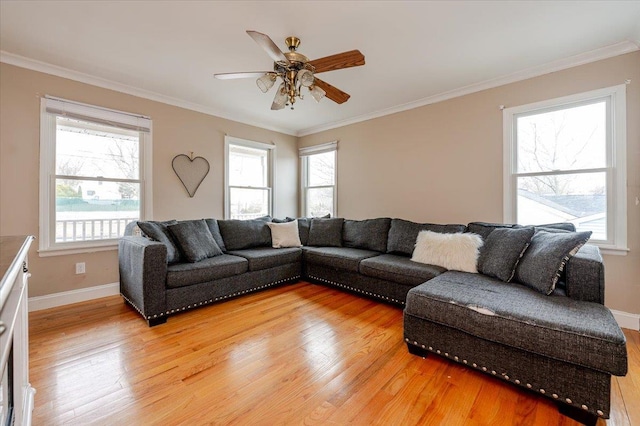 living room featuring crown molding, ceiling fan, and hardwood / wood-style floors