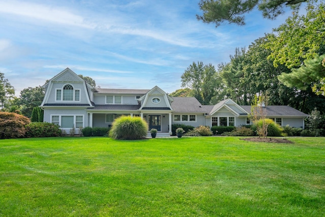 view of front of home with a front lawn