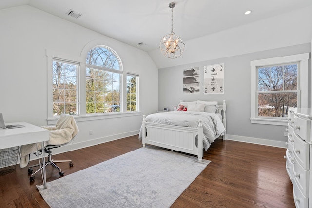 bedroom featuring vaulted ceiling, an inviting chandelier, and dark hardwood / wood-style flooring