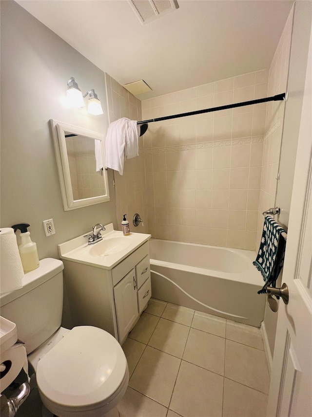 17 Broadway Unit 1K, Harrison, NY 10528 - full bathroom featuring vanity, toilet, tile patterned floors, and tiled shower / bath