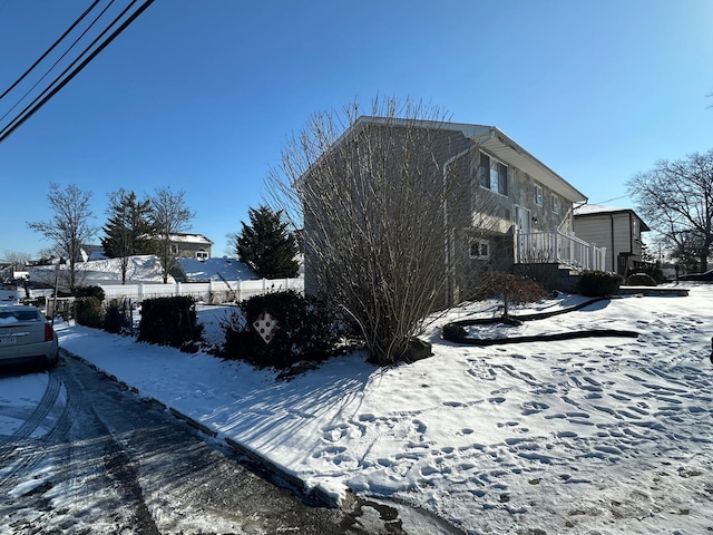 view of snow covered property