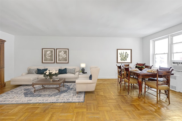 living room with light parquet floors and radiator heating unit