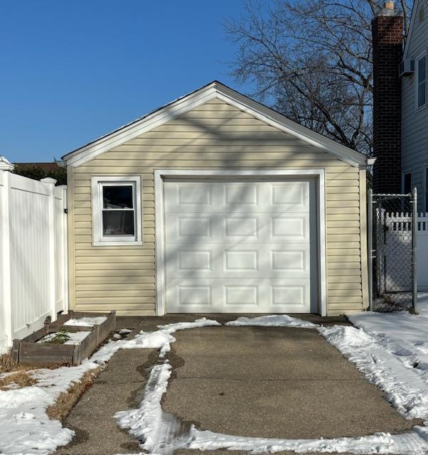 view of snow covered garage