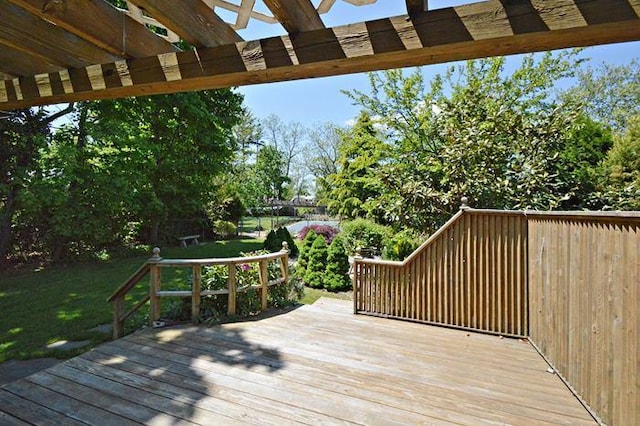 wooden terrace featuring a pergola