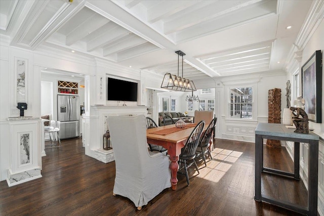 dining room featuring beamed ceiling, ornamental molding, a notable chandelier, and dark hardwood / wood-style flooring