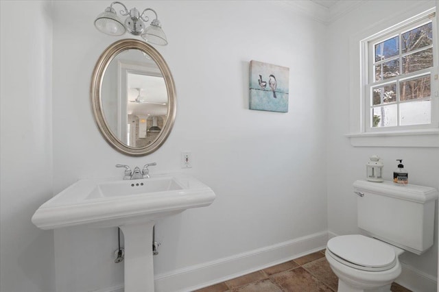 bathroom with tile patterned floors and toilet