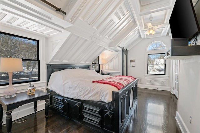 bedroom featuring multiple windows, dark hardwood / wood-style flooring, and ceiling fan