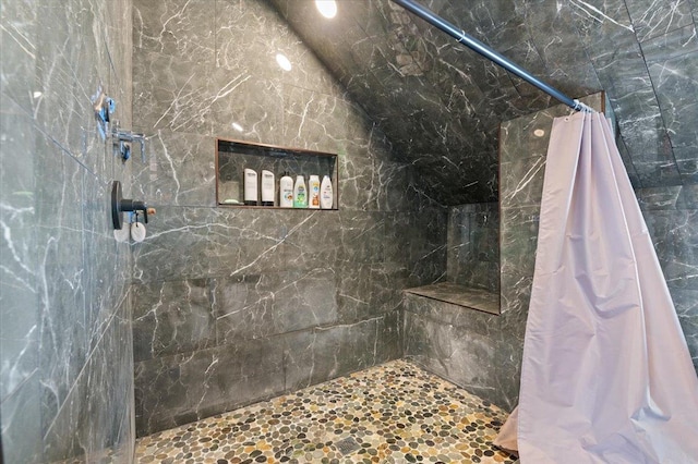 bathroom with a shower with curtain