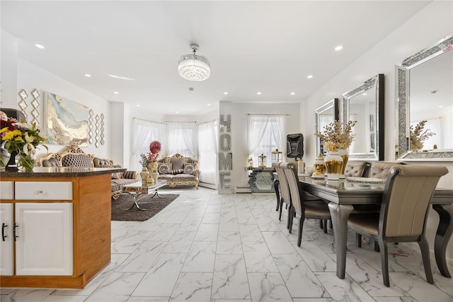 dining space featuring a baseboard radiator