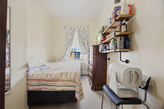 bedroom featuring baseboard heating