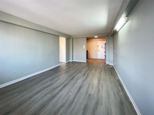 unfurnished living room featuring hardwood / wood-style floors