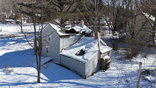 view of snow covered property