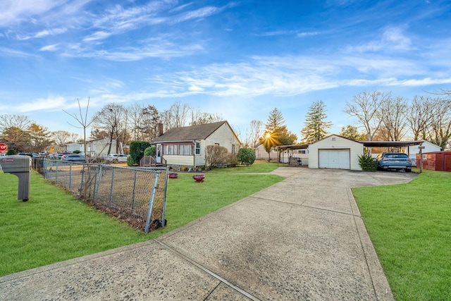 ranch-style home with an outbuilding, a carport, a garage, and a front yard