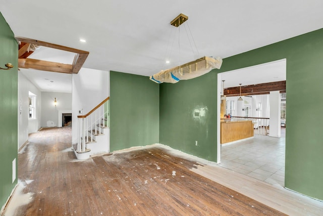 empty room with light hardwood / wood-style floors