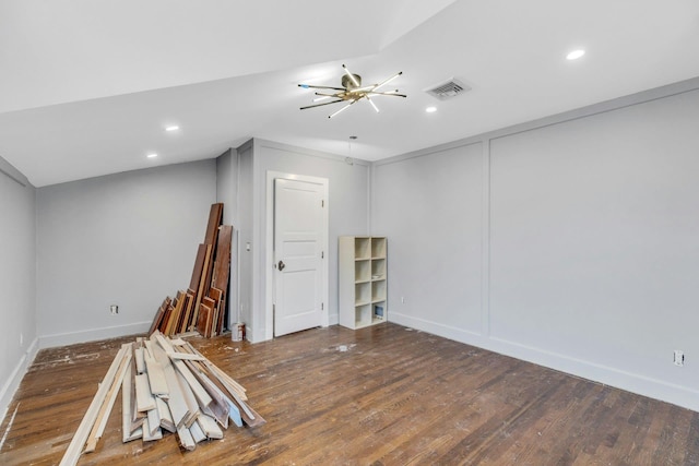 spare room featuring dark wood-type flooring