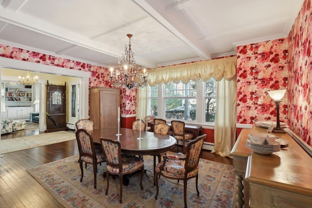 dining room with ornamental molding, dark wood-type flooring, a chandelier, and baseboard heating