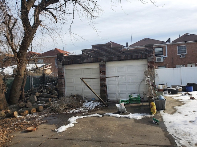 view of snow covered garage