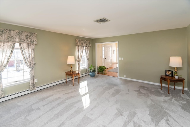 unfurnished room with light carpet and baseboard heating