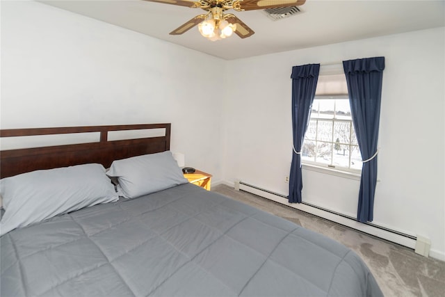 unfurnished bedroom featuring ceiling fan, carpet floors, and baseboard heating