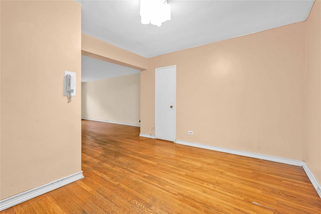 spare room featuring light wood-type flooring