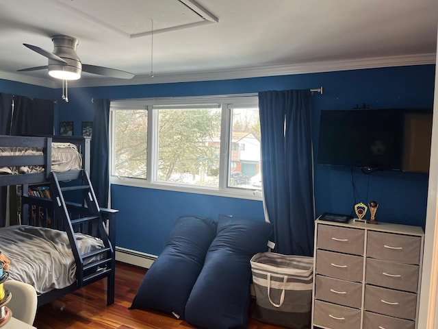 bedroom with wood-type flooring, crown molding, a baseboard radiator, and ceiling fan