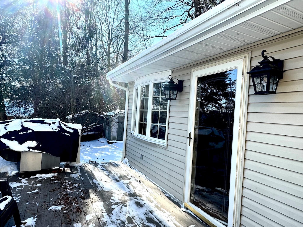 view of snow covered deck