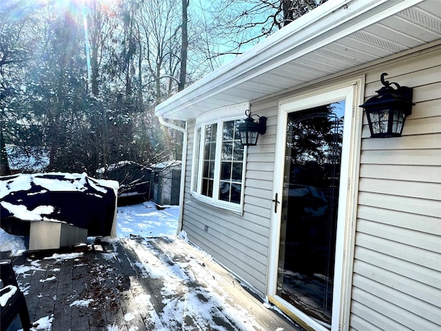 view of snow covered deck