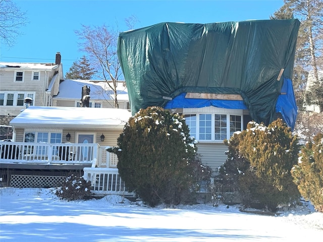 view of front of home with a deck