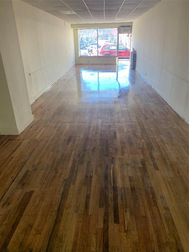 spare room with dark wood-type flooring