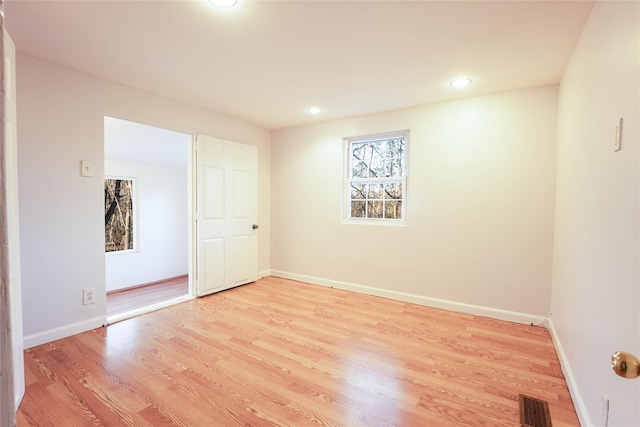 interior space with baseboards, visible vents, recessed lighting, and light wood-style floors