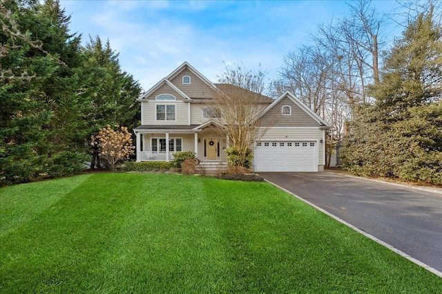 craftsman-style home with a garage and a front lawn