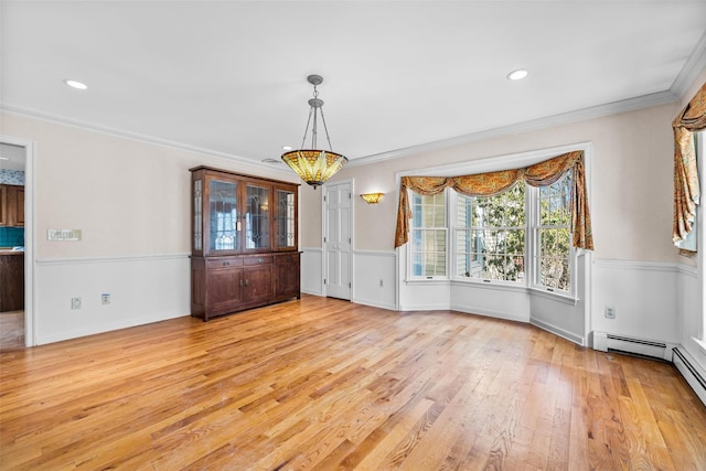 unfurnished dining area with light wood-style flooring, recessed lighting, a notable chandelier, baseboard heating, and crown molding