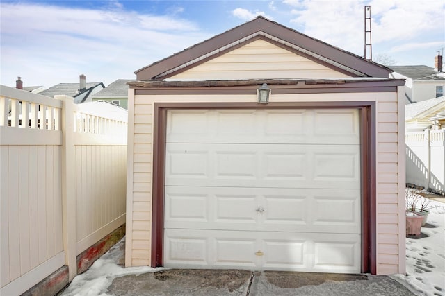 view of snow covered garage