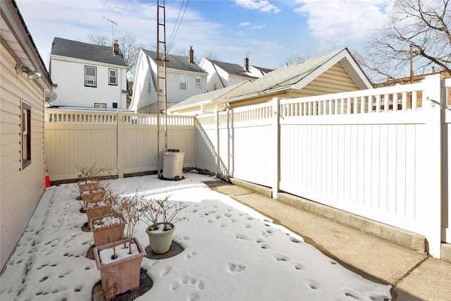 view of snow covered patio