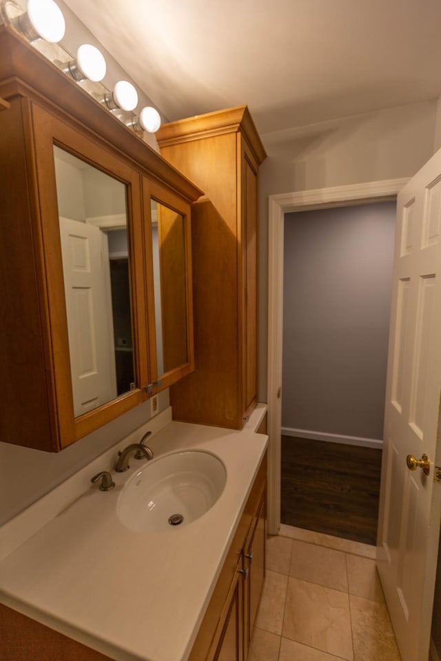 bathroom featuring tile patterned floors and vanity