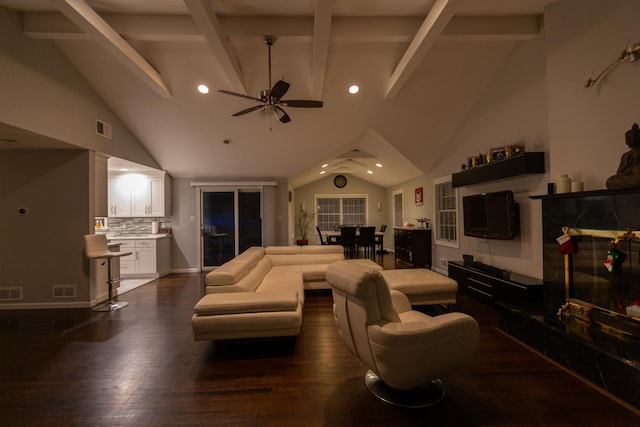 living room with a high end fireplace, lofted ceiling with beams, dark hardwood / wood-style floors, and ceiling fan