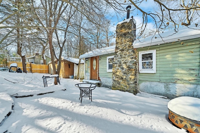 view of snow covered property