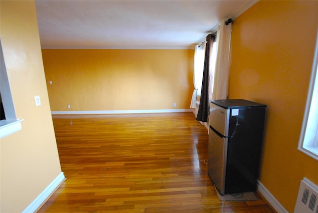 interior space with hardwood / wood-style floors