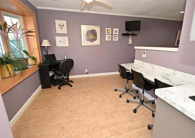 office area featuring ornamental molding, light hardwood / wood-style floors, and ceiling fan