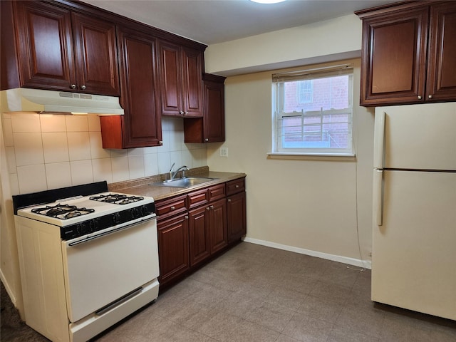 kitchen featuring white appliances, sink, and decorative backsplash