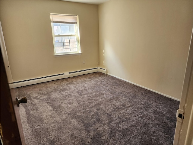 carpeted empty room with a baseboard radiator