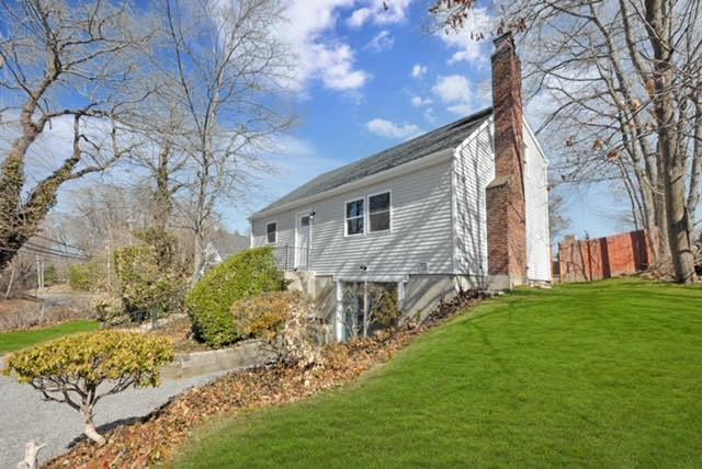 exterior space with a yard and fence