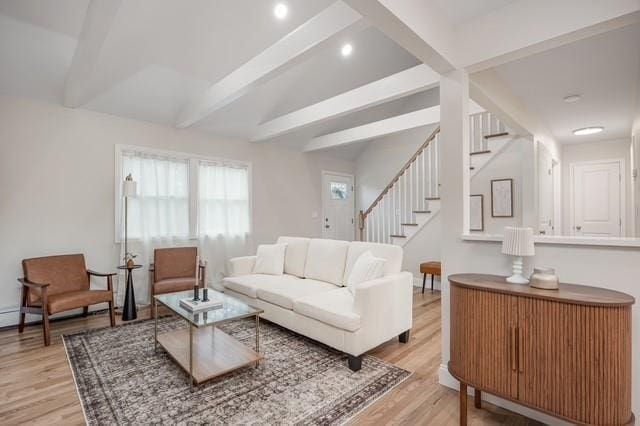 122 Vernon Valley Rd, East Northport, NY 11731 - living area with stairway, light wood finished floors, beam ceiling, and recessed lighting