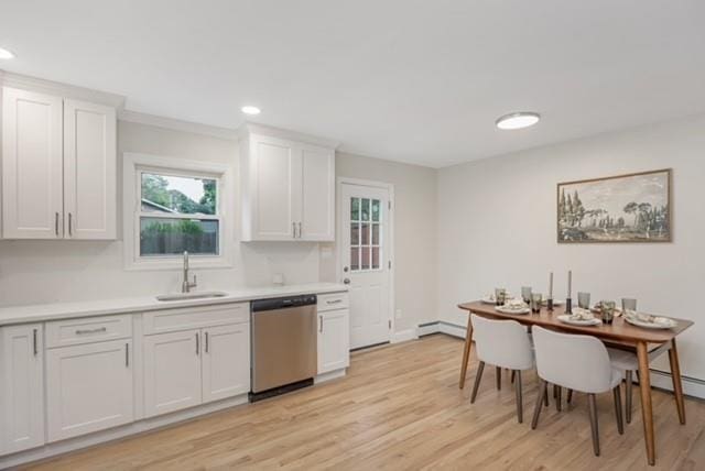 122 Vernon Valley Rd, East Northport, NY 11731 - kitchen featuring dishwasher, baseboard heating, light countertops, recessed lighting, and light wood-style flooring